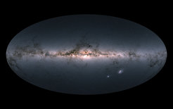 This is not an image of the Milky Way. Each dot of light is a source that has been documented and analyzed as part of the Gaia mission. Put each source in its proper position in the sky, and give it the color that was measured by Gaia through red and blue filters, and the catalogue of 1.7 billion sources coalesces into a faithful rendition of the Milky Way, of our two closest galactic neighbours the Magellanic clouds, and of many more distant cosmic objects, as seen from Earth.