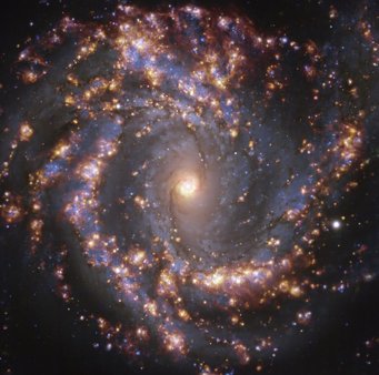 PHANGS-MUSE-Map of the nearby spiral galaxy NGC4303 showing the distribution of young star-forming regions (HII regions; reddish colors) relative to the young and old stellar populations. PHANGS-MUSE-Map of the nearby spiral galaxy NGC4303 showing the distribution of young star-forming regions (HII regions; reddish colors) relative to the young and old stellar populations.