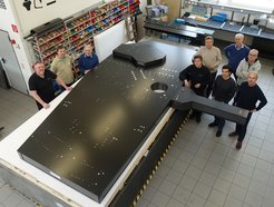 The "MICADO Relay Optics Bench" completed by CarbonVision during acceptance by the MPIA MICADO team. From left to right:Alexander Deckert (Production Manager Carbon-Werke), Ralph Hofferbert (MPIA) , Franz Weißgerber (Company founder Carbon Werke), Wolfgang Thum (Assembly Carbon-Werke), Wolfram Schlossmacher (Managing Director CarbonVision), Santiago Barboza (MPIA), Friedrich Müller (MPIA), Ralf-Rainer Rohloff (MPIA), Helmut Espig (Design CarbonVision).