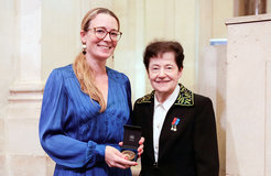 Myriam Benisty (left) receiving the Prix Madame Victor Noury in Paris